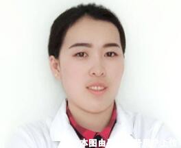 葛显